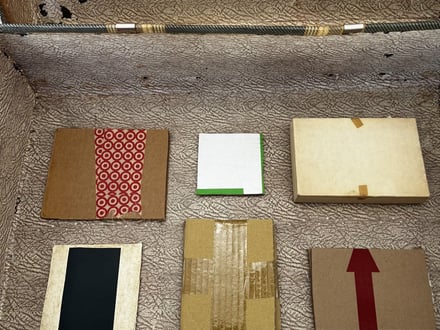 Traveling cases, found photographs and other puzzles